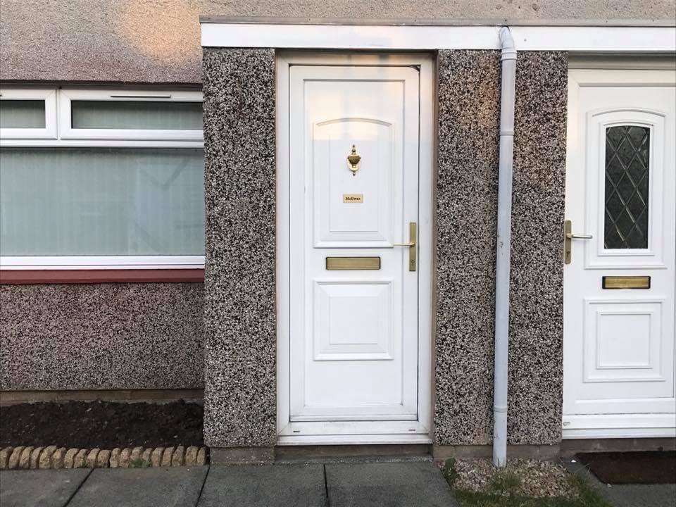new black composite door recently fitted in rosyth
